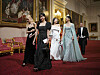 Members of K-pop girl group Blackpink head into the state banquet at Buckingham Palace in London Tuesday, celebrating the state visit to Britain by President Yoon Suk Yeol. [AP/YONHAP]