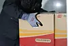 A Korea Post courier delivers packages on Nov. 23, 2020. [NEWS1]