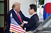 Korean President Lee Jae Myung, right, is greeted by U.S. President Donald Trump ahead of their first bilateral summit at the White House in Washington on Aug. 25. [JOINT PRESS CORPS]