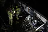 Generalitat's firemen work at the place where a train crashed with a collapsed wall which fell to the via at Gelida city in Barcelona, Spain, on Jan. 20. [EPA/YONHAP]