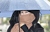 Moon Da-hye, daughter of former President Moon Jae-in, arrives at the Seoul Western District Court on Nov. 27 for the first appeals hearing after being fined in the first trial for drunk driving and operating illegal lodging businesses. [NEWS1]