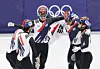 Members of the Korean men's 5,000-meter short track speed skating relay team celebrate after winning the silver medal at the 2026 Winter Olympics at Milano Ice Skating Arena in Milan on Feb. 20. [YONHAP]