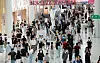 The duty-free shops at Terminal 1 of Incheon International Airport in Incheon are crowded with tourists on June 6. [NEWS1]