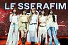 Members of girl group Le Sserafim pose for photos during a showcase held on March 14 at the Yes24 Live Hall music venue in eastern Seoul for the group's fifth EP 'Hot.' [DANIELA GONZALEZ PEREZ]