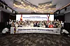 The participants of the Overseas Korean Adoptees Gathering and Lee Key-cheol, commissioner of the Overseas Korean Agency (OKA), center, pose for a photo during the opening ceremony of the event at Conrad Seoul in Yeouido, western Seoul, on Tuesday. [OVERSEAS KOREAN AGENCY]