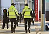 Police officers on Monday patrol Seoul National University Hospital, where Democratic Party chief Lee Jae-myung is recovering from an attack on Jan. 2. [YONHAP]