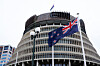 New Zealand's flag flutters in front of ″The Beehive,″ the executive wing of the New Zealand Parliament Buildings, in Wellington, New Zealand on Sept. 24. [REUTERS/YONHAP]
