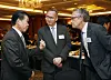 Amcham CEO and Chairman James Kim, left, speaks to British Ambassador Colin Crooks, center, and Stephen Dunbar-Johnson, president, international of The New York Times. [PARK SANG-MOON]