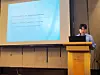 A representative of Hanwha Life’s AI research center presents on research at Icaif 2025, held from Nov. 15 to 18. [HANWHA LIFE]