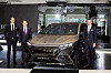 Mathias Vaitl, far right, CEO of Mercedes-Benz Korea, Daniel Lescow, center, head of Mercedes-Maybach at Mercedes-Benz Group, and Kilian Thelen, vice president of product, marketing and digital business at Mercedes-Benz Korea, pose for a photo with the Mercedes-Maybach EQS SUV during a media event Thursday in eastern Seoul. [MERCEDES-BENZ KOREA]
