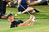Min Woo Lee of Australia plays a shot from the bunker on the 18th hole during the third round of the 2023 Australian Open at the Australian Golf Club in Sydney on Saturday. [AP/YONHAP]