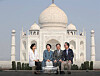 In this photo taken on Nov. 7, 2018, then-first lady Kim Jung-sook, second from left, smiles as she poses for a photograph in front of the Taj Mahal in Agra, India alongside then-Culture Minister Do Jong-hwan, second from right. Shin Bong-kil, Korea's ambassador to India at the time, is on the far right, while his wife Hwang Mee-sook sits on the far left. [BLUE HOUSE]