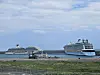 Ovation of the Seas, right, and the Adora Magic City cruise ships are docked at the Gangjeong Port in Jeju Island on May 10. [JEJU SPECIAL SELF-GOVERNING PROVINCIAL OFFICE]