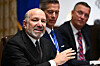 U.S. Secretary of Commerce Howard Lutnick, left, speaks during a Cabinet meeting with U.S. President Donald Trump in the Cabinet Room of the White House in Washington on Aug. 26. Also pictured, from left to right, are Secretary of Transportation Sean Duffy and Secretary for Veterans Affairs Doug Collins. [AFP/YONHAP]