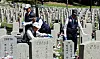 National merit recipients clean gravestones at the Seoul National Cemetery in Songpa District, southern Seoul, on June 3, 2024. [NEWS1]