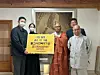 Yang Hyeon-woo, left, and Ju So-yeon, second from left — the first couple to marry after meeting through the matchmaking temple stay program ″Naneun Jeollo,″ or “I’m Going to the Temple” — visit Baegyang Temple ahead of their wedding later this month to make a donation to the Korean Buddhist Foundation for Social Welfare. [JOGYE ORDER]