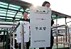 Local election workers at Incheon Port carry ballot boxes to a ferry that will transport the boxes to islands in the Yellow Sea on May 27. [NEWS1]