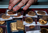 In this photo illustration, gold coins are displayed at Witter Coins in San Francisco, California, on Oct. 7. [AFP/YONHAP]