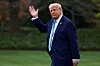U.S. President Donald Trump waves as he walks before departing for Florida from the South Lawn at the White House in Washington, D.C., U.S., on March 28. [REUTERS/YONHAP]