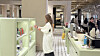A participant of K-culture Transit Tour browses different hair products at The Hyundai Seoul on Feb.5. [WOO JI-WON]
