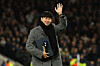 Former Tottenham Hotspur player Son Heung-min, who left the club in the summer, waves goodbye to fans on the pitch ahead of the UEFA Champions League football league stage match between Tottenham Hotspur and Slavia Prague at the Tottenham Hotspur Stadium in London, on Dec. 9. [AFP/YONHAP]