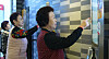 Senior citizens learn to use digital kiosks at a restaurant during a training session by the National Institute for Lifelong Education. [NATIONAL INSTITUTE FOR LIFELONG EDUCATION]