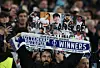 A Tottenham Hotspur fan holds up a scarf of former Tottenham Hotspur player Son Heung-min before a match between Tottenham Hotspur and Slavia Prague at Tottenham Hotspur Stadium in London on Dec. 9. [REUTERS/YONHAP]