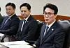 Prime Minister Kim Min-seok, right, presides over a government meeting on handling fake news at the government complex in Jongno District, central Seoul, on Feb. 26. [YONHAP]