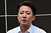 Lee Jun-seok speaks to reporters after a campaign stop in Yeouido Park in western Seoul on May 28. [YONHAP]