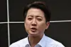 Lee Jun-seok speaks to reporters after a campaign stop in Yeouido Park in western Seoul on May 28. [YONHAP]