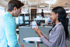 Two people using the Toss payment service [TOSS]