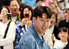 Tottenham Hotspurs captain Son Heung-min greets his fans as he arrives at Incheon International Airport in the afternoon on May 27. [NEWS1]