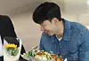 Tottenham Hotspurs captain Son Heung-min receives flowers from fans as he arrives at Incheon International Airport in the afternoon on May 27. [YONHAP]
