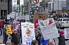 People walk through downtown Anchorage, Alaska, to protest against President Trump and his policies on April 19. [AP/YONHAP]