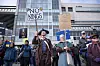 David Teague, a colonial reenactor, holds a sign that says ″No Kings″ during a protest against President Trump and his policies on April 19 in Anchorage, Alaska. [AP/YONHAP]