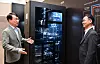 Lee Jae-sung, left, executive vice president and head of LG Electronics' ES Business Division, examines a cooling distribution unit (CDU), part of the company's liquid-cooling solution for AI data centers. [NEWS1]