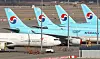 Korean Air Lines and Asiana Airlines aircraft parked at Incheon International Airport on Dec. 1. [NEWS1]