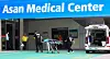 An ambulance is parked in front of the emergency room at Asan Medical Center in Songpa District, southern Seoul, on Wednesday. Asan’s medical professors announced that surgeries and outpatient treatments will be reduced starting Thursday. [YONHAP]