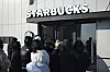 Visitors wait to enter at newly opened Starbucks store at the observatory of the Aegibong Peace Ecopark in Gimpo, South Korea on Friday. [AP/YONHAP]