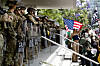 Protesters stand off against California National Guard soldiers at the Federal Building in downtown Los Angeles during a ″No Kings″ protest on June 14. [AP/YONHAP]