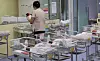 Medical staff take care of newborns at a hospital in Michuhol District, Incheon, on Feb. 26. [YONHAP]