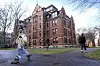 People walk between buildings on Dec. 17, 2024, on the campus of Harvard University in Cambridge, Massachusetts. [AP/YONHAP]