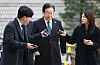 Liberal Democratic Party leader Lee Jae-myung, center, attends a court hearing over development corruption and bribery charges arising from his term as mayor of Seongnam, Gyeonggi, years ago, on March 11. [YONHAP]