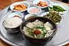 A bowl of gukbap (soup mixed with rice) at a restaurant in Busan [JOONGANG ILBO]