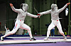 Korea's Choi Se-bin, left, competes against Japan's Misaki Emura in the women's sabre individual round of 16 during the Paris Olympics at the Grand Palais in Paris on Monday.  [AFP/YONHAP]