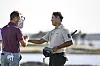 Kim Si-woo, right, and Justin Thomas shake hands on the 18th hole green during the third round of the RBC Heritage at Harbour Town Golf Links on April 19 in Hilton Head Island, South Carolina. [GETTY IMAGES]