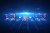 Members of team T1 are seen on the screens during the final round of the 2023 League of Legends World Championship against China's Weibo Gaming at Gocheok Sky Dome in western Seoul on Nov. 19. [AP/YONHAP]