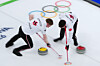 Canada's Brett Gallant and Marc Kennedy compete in a men's curling semifinal match at the 2026 Winter Olympics, in Cortina, Italy, on Feb. 19. [AP/YONHAP]