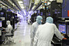 Workers are seen on the production line of SK hynix's memory chip plant in this undated file photo. [SK HYNIX]