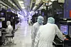 Workers are seen on the production line of SK hynix's memory chip plant in this undated file photo. [SK HYNIX]